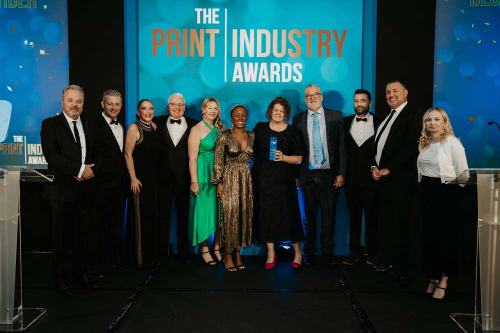 The BPIF Training team on stage at the Print Industry Awards 2026, holding the Training and Support Provider award